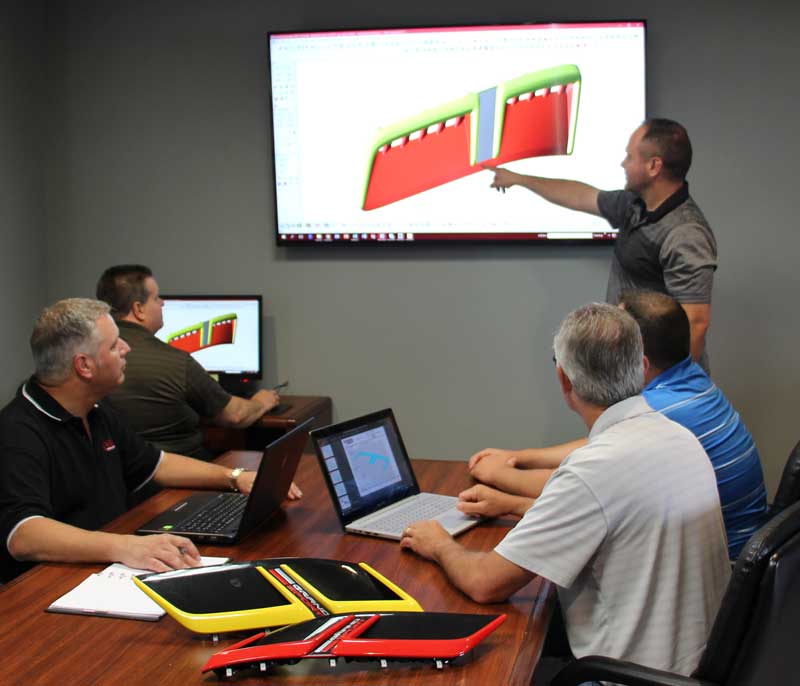 Project managers in a meeting at Superior Tool & Mold